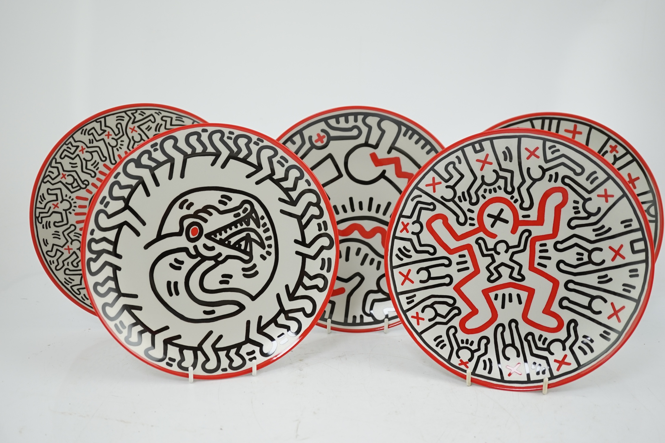 Keith Haring (American, 1958-1990) designs, a set of six Ligne Blanche, Limoges porcelain plates